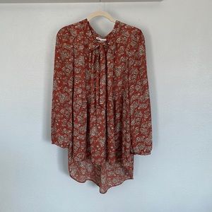 Long sleeve blouse, ruffle bottom, longer in the back, super flowy